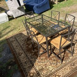 Glasstable W/6 Wicker Chairs 