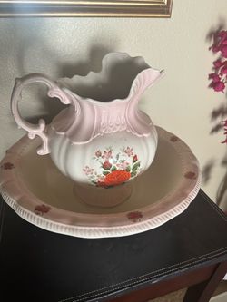 Arnel’s Pottery pink and cream