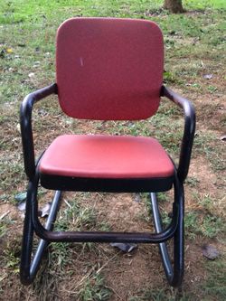 Antique Child’s Black Metal Rocker with Red Vinyl Seat