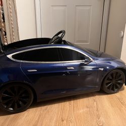 Kids Tesla By Radio flyer 