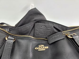 Coach bag with online side pockets