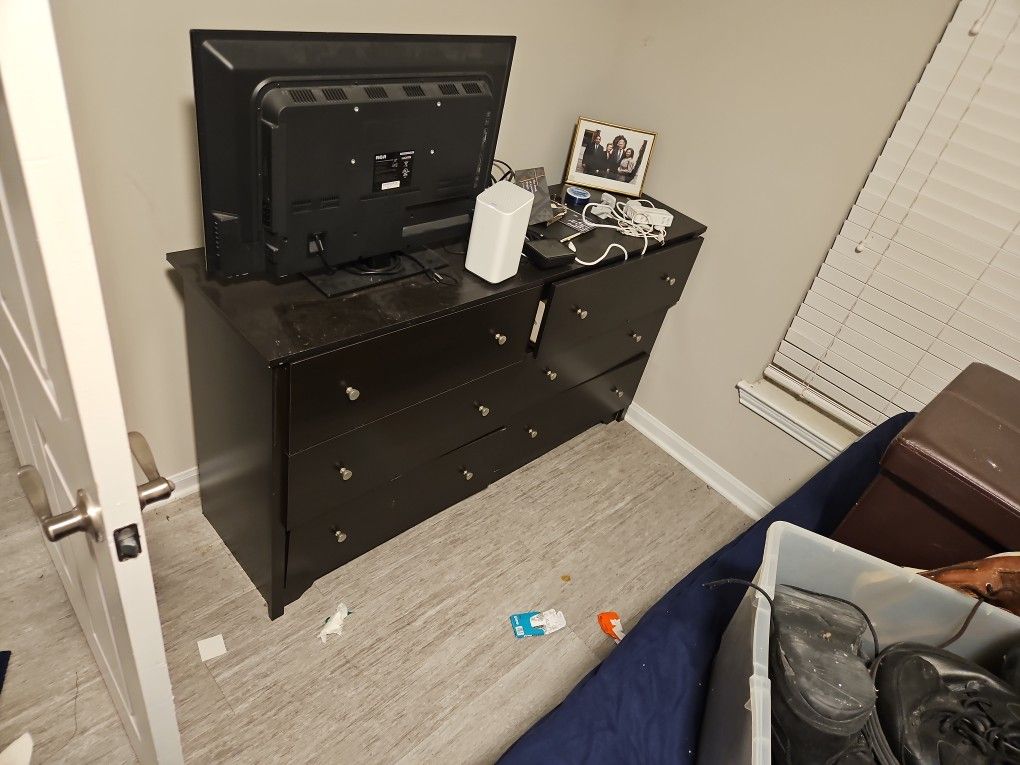 wooden dresser it is slightly unalligned