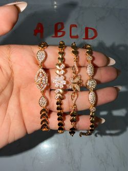 Gold toned bracelets