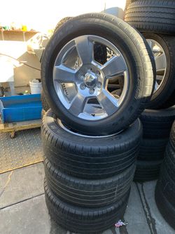 OEM chevy wheels size 20" with 4 used tires 275-55-20 goodyear $1,100 wheels and tires
