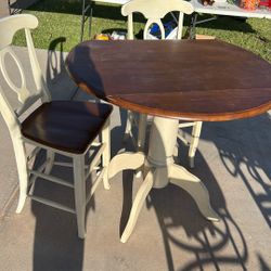 Tigh Top Table And Chairs