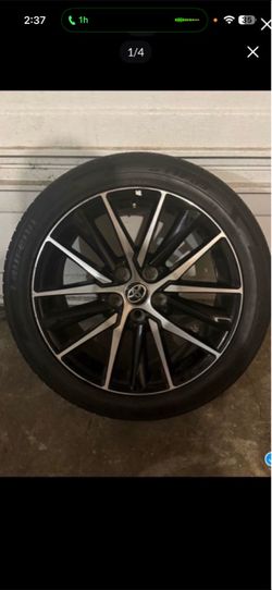 A used set of four OEM Toyota 17-inch machined-face alloy wheels