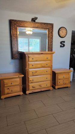 NICE SOLID WOOD TALL DRESSER AND TWO MATCHING NIGHTSTANDS