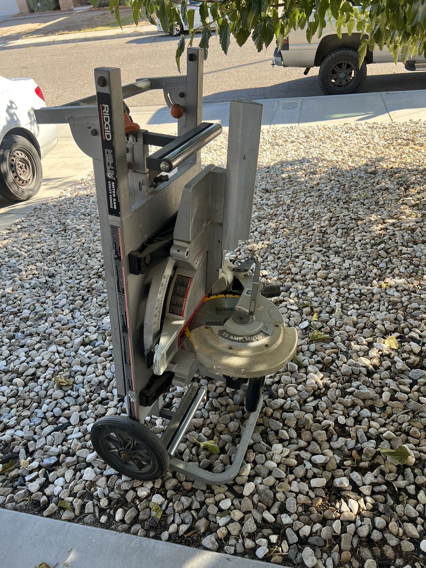 12” Delta miter saw with rolling stand.