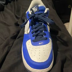 10.5 nike air force 1 low in a blue and white colorway