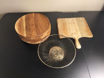 Wood plates, charcuterie board and fruit bowl