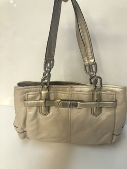 Metallic light gold Coach purse