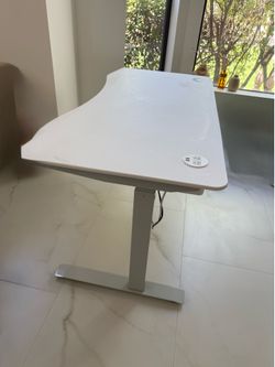 Adjustable height desk