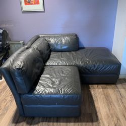 Black leather Sectional Couch