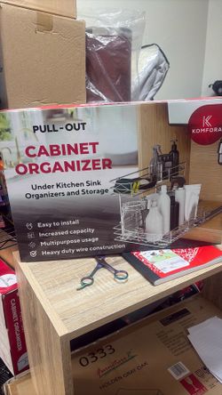 Pull out cabinet organizer