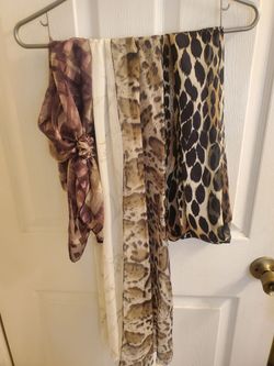4 new pretty Scarfs Each At $10