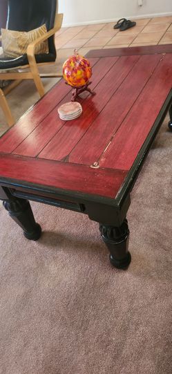 Red wooden coffee table