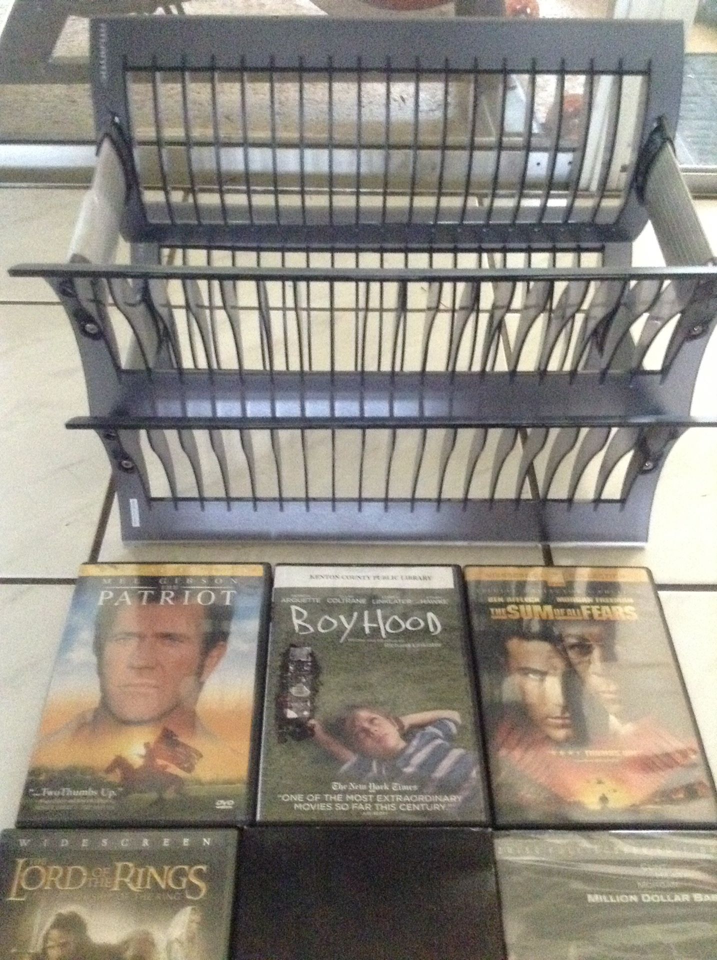 Great DVD's with 1 storage rack. Some unopened. 50 cents- $1.00 each. Good offer takes it all. Call for titles. {contact info removed}.