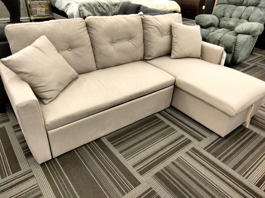2pc Sectional W/ Pull out Bed And Storage 