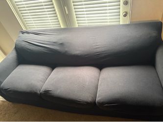 Couch with black slip covers
