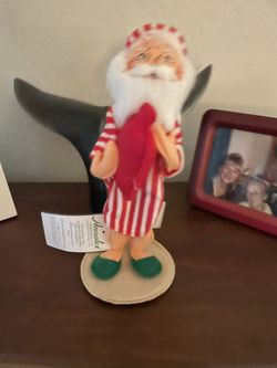 9” SANTA IN PJ’S HOLDING A HOT WATER BOTTLE