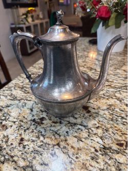 antique, silver-plated coffee or tea pot