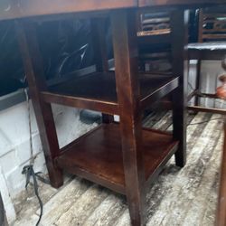 Wooden round table and chairs