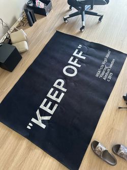 “Keep Off” area rug
