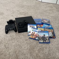 PLAYSTATION PRO, WITH REMOTES AND GAMES