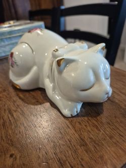 White Porcelain Cat Figurine with Gold Accents