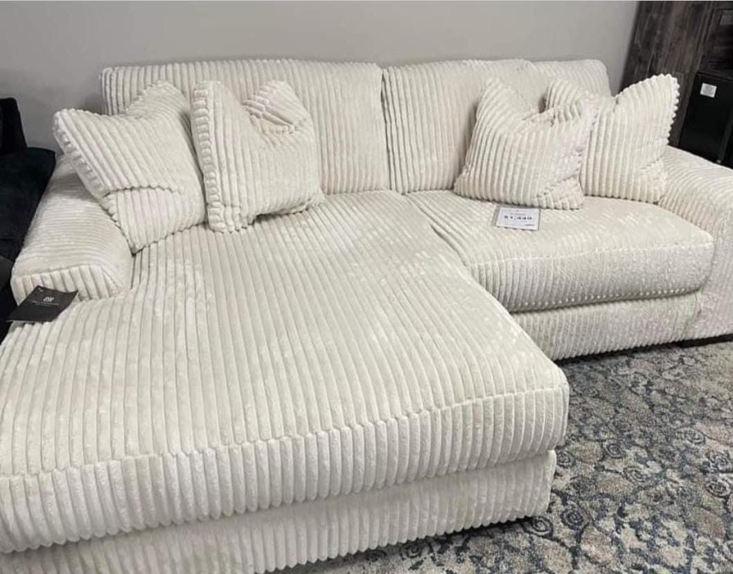 Lindyn Ivory 2 Piece Sofa Chaise Sectional 