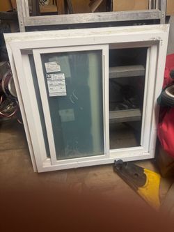 Vinyl retrofit window