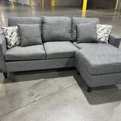 Living Spaces Grey Couch