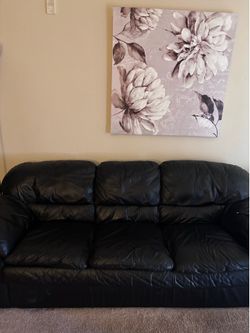 Black leather sofa