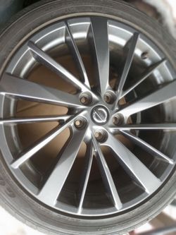 Nissan Stock Dark Gray 19" Rims with Tires
