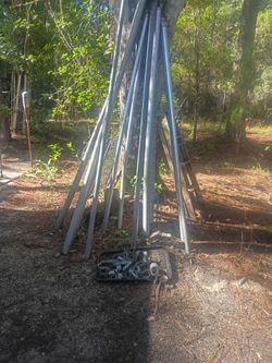 Fence Poles &  Clamps. Not used and used mixed.