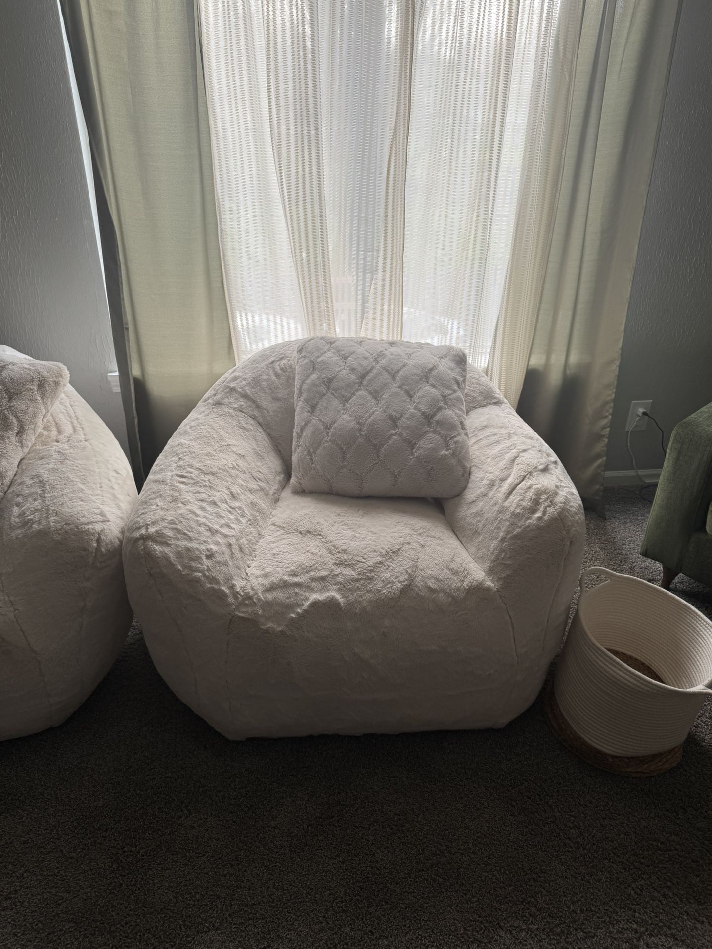 2 Fluffy Cream Swivel Chairs / Bobs Discount Furniture