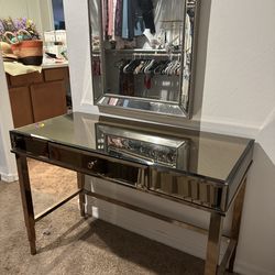 Mirrored vanity includes mirror