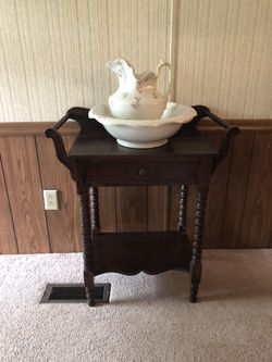 Antique pitcher, wash bowl and cabinet