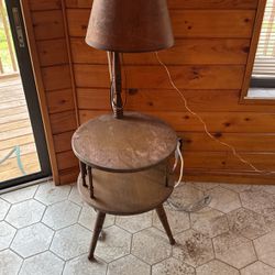 an antique table with lamp