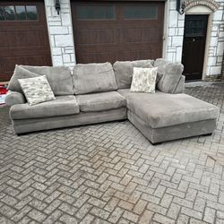 plush gray sectional L-shaped couch 
