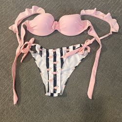 Super cute pink, black and white bikini. Never worn.