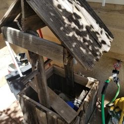 Well house garden hose container