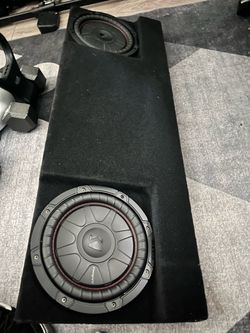 Under the seat, subwoofer box