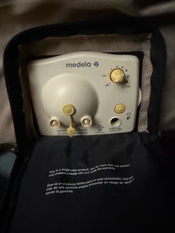 Breast pump in portable bag