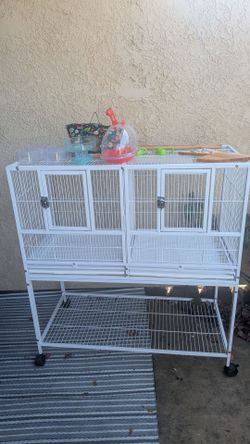 Large Bird cage with divider and all accessories included
