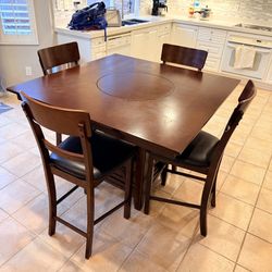 Counter height Dinning Table Set With Center Rotating Console. 