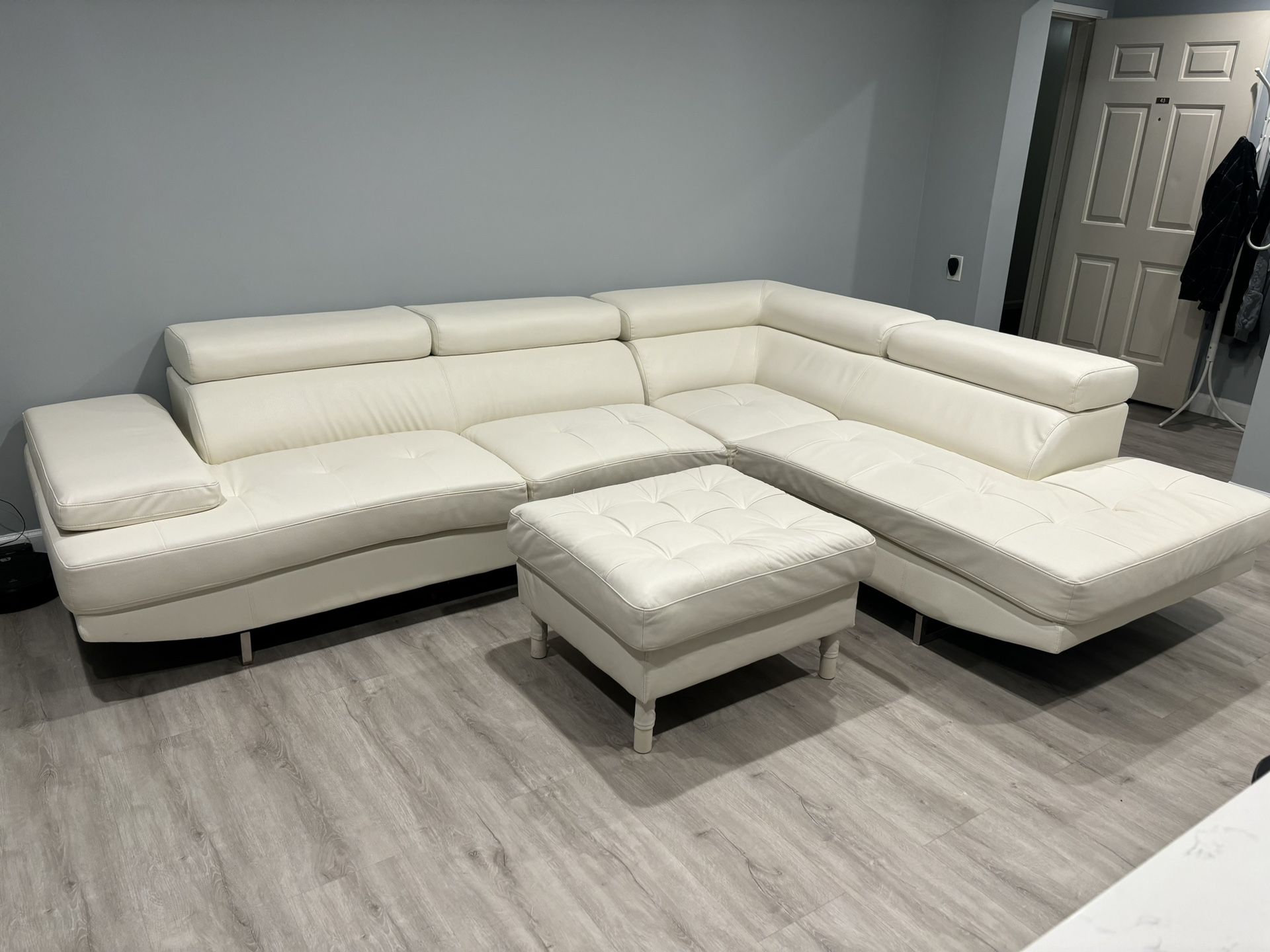 White Leather Couch with coffee table