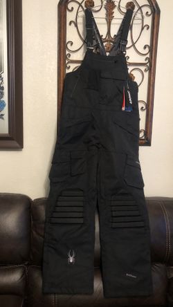 SPYDER  MEN’S SKI BIB & WOMENS NAVY  SLING FITS SKI SUITS ASKING 100 EACH  REGULAR PRICE 300  EACH CASH ONLY AVAILABLE 