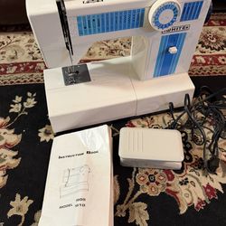 White Sewing Machine Model 1510 with foot pedal
