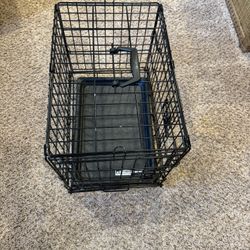 Brand New  black, folding metal dog crate K-9 Keeper model.  Size 19” x 13” x 16”q